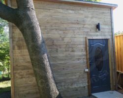 8x12 shed, fiberglass door, concrete ramp, steel roof